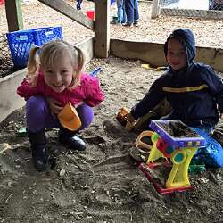 Kids playing in a sandbox